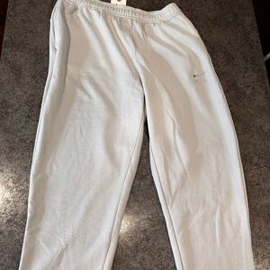 Two pairs of brand new Nike joggers. Loose fit. Never worn. Men’s large. Hurry!